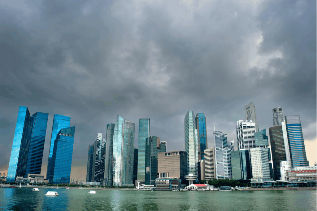 Panoramic skyline views of Singapore’s iconic skyline at with rain clouds, showcasing singapore skyline dining with rooftop bar experiences at Marina Bay Sands, surrounded by rooftop restaurants overlooking Marina Bay and the glittering city skyline. Highlights include club lounge settings with signature cocktails, contemporary Asian cuisine at La Vi, indulgent Italian flavors at Lavo Italian Restaurant, and elevated sips at a sky bar. Luxurious private dining rooms and lounge bar spaces in the Marina Bay Financial Centre rank among the best rooftop restaurants and best rooftop bars in restaurants in Singapore, blending bar and restaurant concepts with modern Asian cuisine by Executive Chef Sam Chin. Perfect for a romantic restaurant date with breathtaking views, an exclusive wine chamber, alfresco balconies, and an unparalleled dining experience with views of Marina Bay. Guests enjoy world wines, vistas of the Ocean Financial Centre, and panoramic views across the Marina Bay area. The vibrant atmosphere suits weekday lunch, special dinner, or after work drinks, with freshest seafood, Maine lobster, and seasonal ingredients. From Sentosa Island to Downtown Singapore, rooftop dining under city lights offers stunning views from venues like Outpost Hotel, Customs House, and Mount Faber Peak. Whether at a restaurant with a view, Spago Bar, Artemis Grill, or Civic District hotspot, enjoy corporate events, dining experience perfection, amazing views, and an impressive selection from an extensive wine list. Savor Italian restaurant elegance, European classics, and scenic views near Raffles Place, Collyer Quay, OUE Bayfront, and Marina Bay Financial. From cé la vi to sea level dining rooms, book ahead to dine with views of the city, skyline views, sweeping vistas, and night magic in the city.
