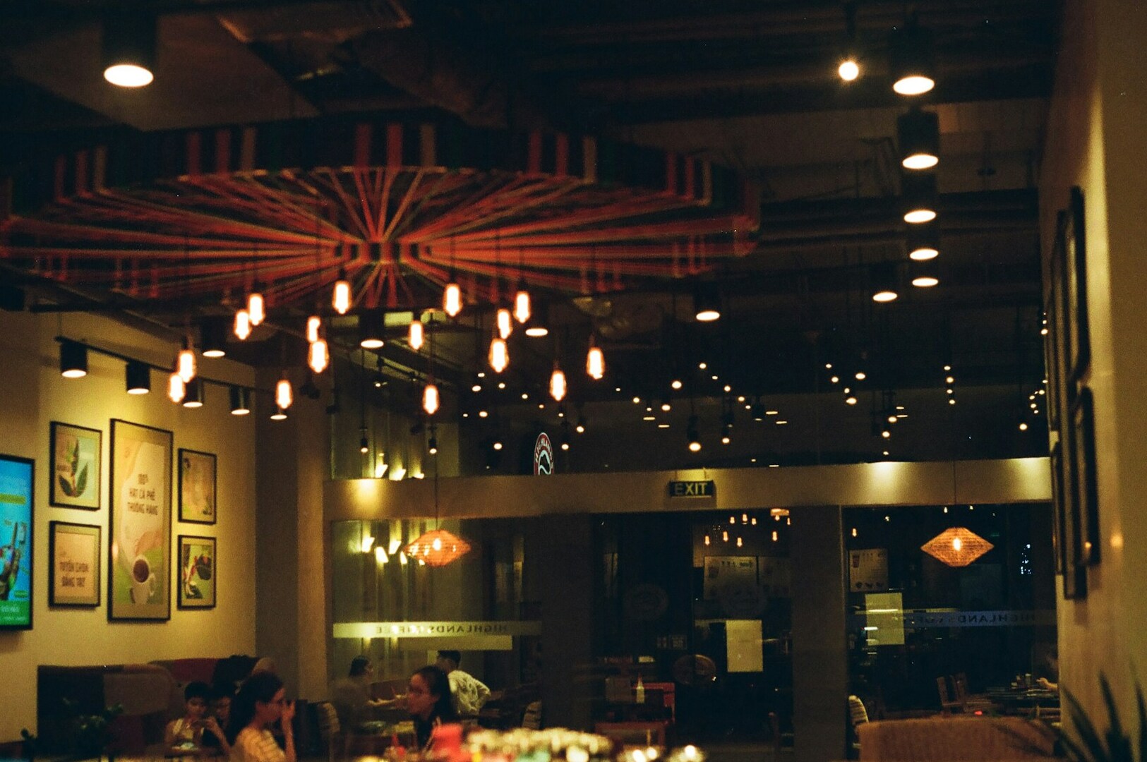 Elegant restaurant interior featuring a large chandelier, highlighting the luxurious ambiance of a Michelin-starred dining experience.