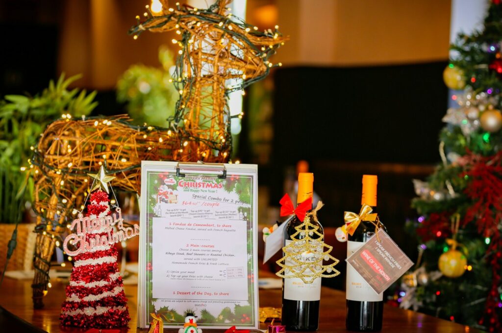 A table and chairs set in a dimly lit restaurant, showcasing an intimate dining atmosphere in Singapore.