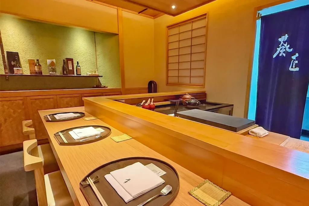 Traditional Japanese omakase counter seating interior at Ki Sho restaurant.
